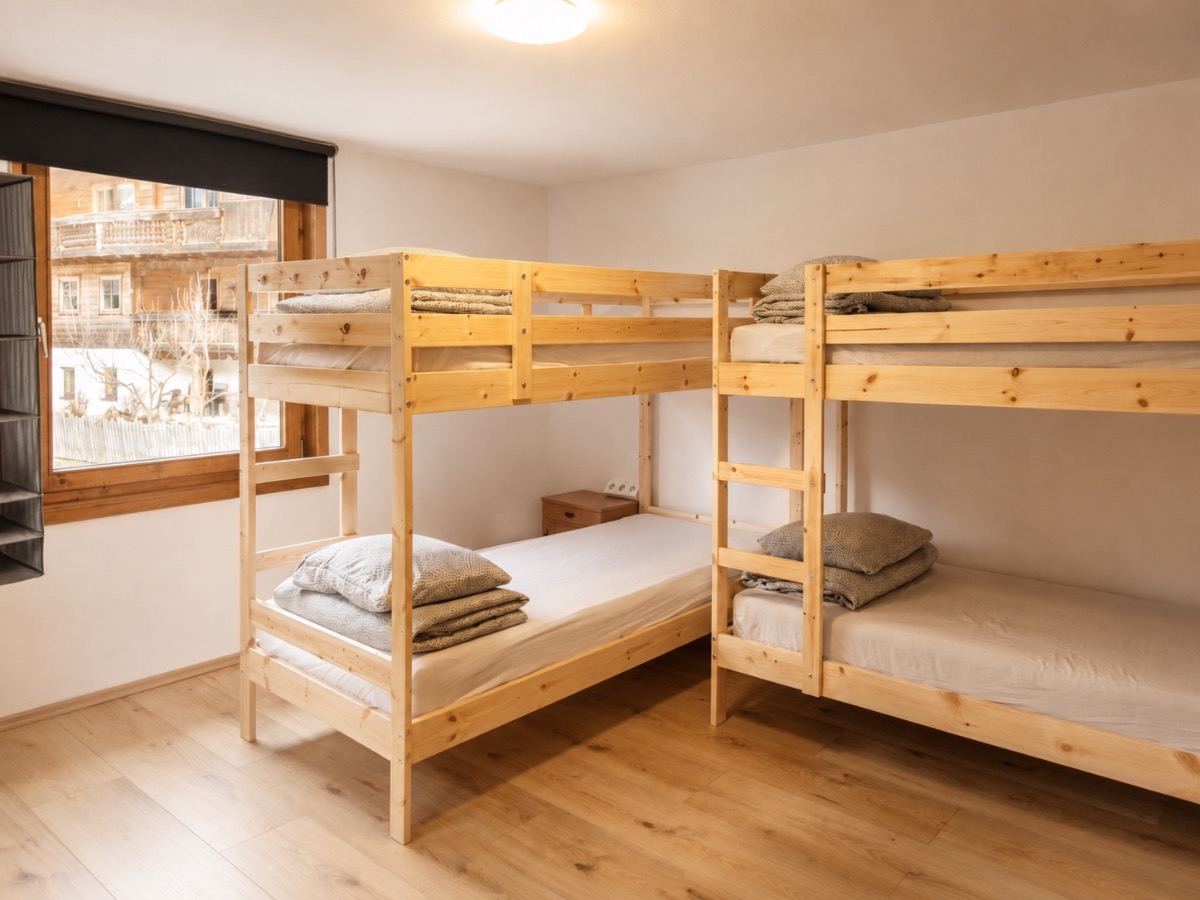 A shared room with two sets of bunk beds