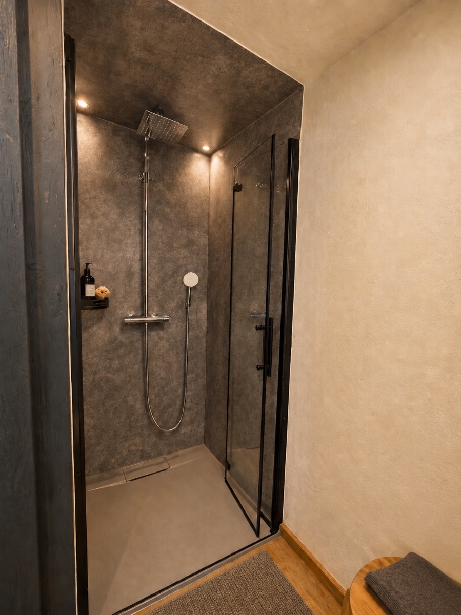 A private walk-in rainfall shower